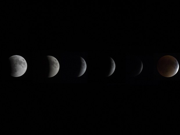 Esta imagem composta mostra a progressão do eclipse lunar total para uma lua de sangue (Foto: AFP PHOTO / Jim Watson)