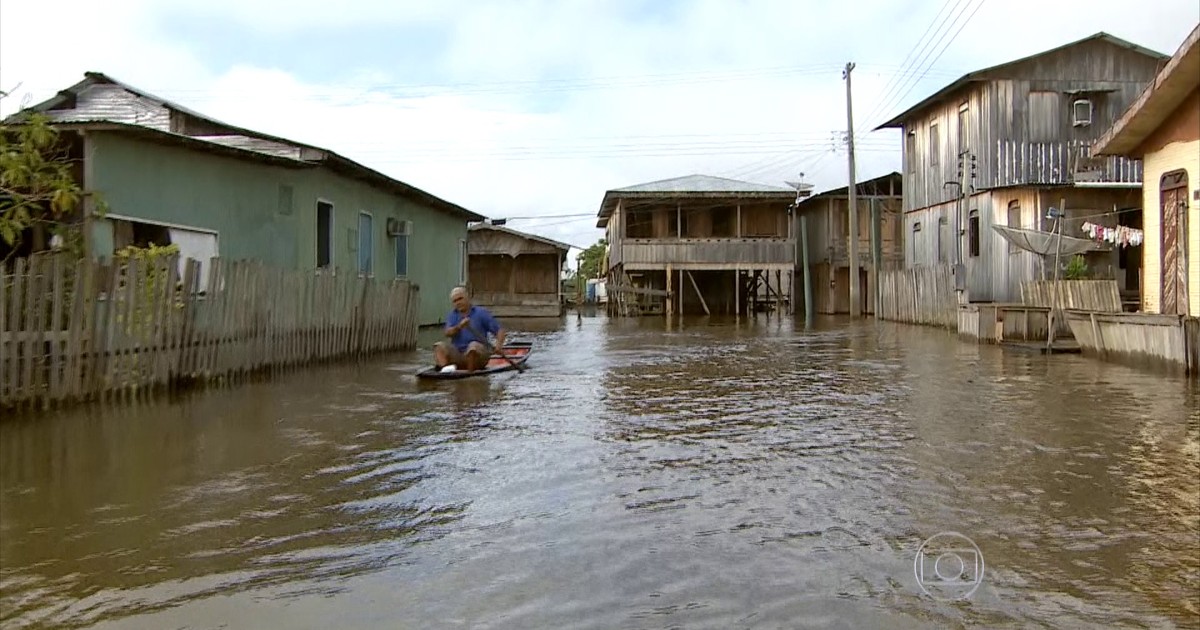 Jornal Hoje - Nível do Rio Negro ultrapassa cota de emergência e alaga