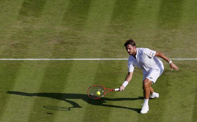 Stanislas Wawrinka vence dominicano Victor Estrella Burgos em Wimbledon tênis (Foto: Reuters)