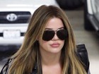 Khloe Kardashian chama a atenção por lábios volumosos