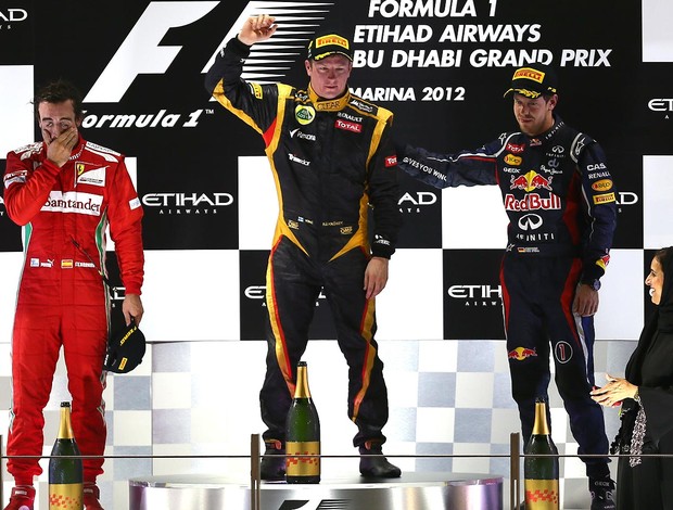 alonso raikkonen e vettel pódio do gp de abu dhabi (Foto: Agência AFP) alonso raikkonen e vettel pódio do gp de abu dhabi (Foto: Agência AFP)