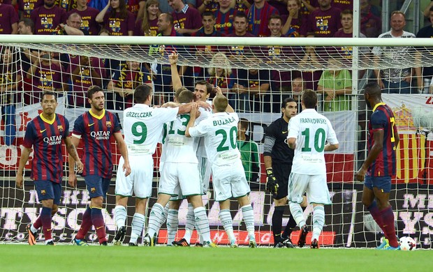 Lechia comemora gol contra o Barcelona (Foto: Agência AFP)