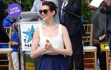 Look do dia: Anne Hathaway usa top cropped e saia mídi em Miami