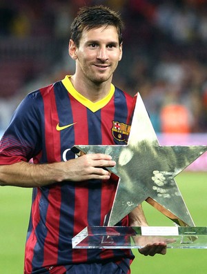 Messi prêmio jogo Barcelona e Santos (Foto: EFE)