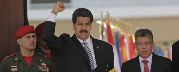 Nicolás Maduro assume como presidente interino da Venezuela (Começa a cerimônia de posse de Nicolás Maduro na Venezuela (Começa a cerimônia de posse de Nicolás Maduro na Venezuela (Opositor venezuelano diz que presidência interina de Nicolás Maduro é ilegítima (Posse de Maduro será na Assembleia (Posse de Maduro se)