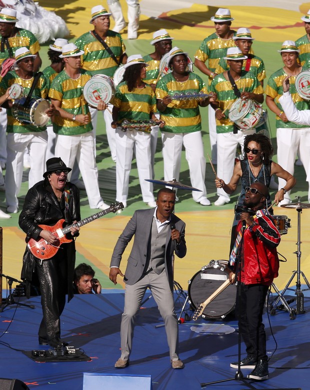 Carlos Santana, Wyclef Jean e Alexandre Pires (Foto: Reuters)