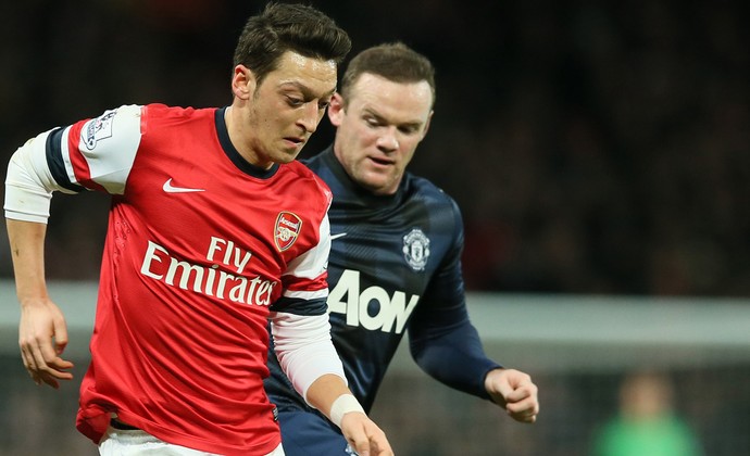 Ozil Arsenal and Manchester United Rooney (Photo: AP)