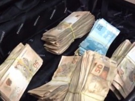 Casal atira em PM no PR, foge e larga fuzil e mala com R$ 100 mil (Reprodução/RPC)