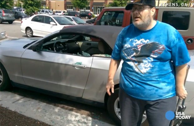 Michael Hammons foi preso por arrombar carro para ajudar cão deixado em carro (Foto: Reprodução/YouTube/USA Today)