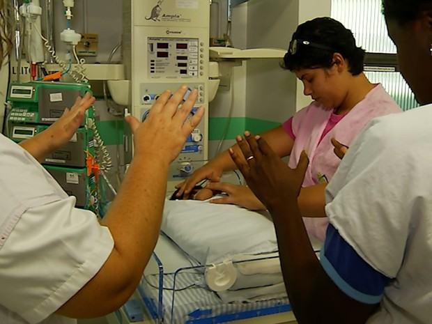 Pesquisadores em MG avaliam efeitos do passe esprita na medicina (Foto: Reproduo/TV Integrao)