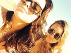 Anitta curte sexta-feira ensolarada na praia com amiga