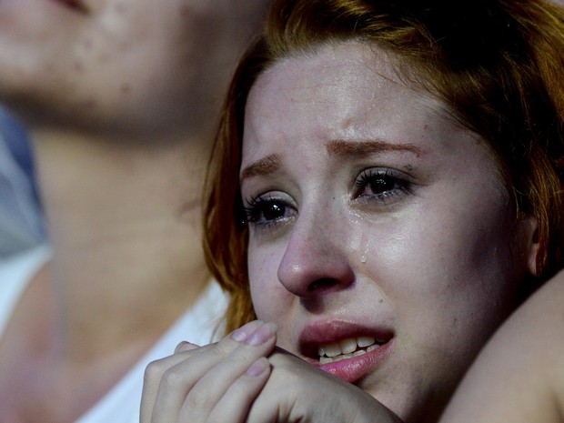 Fã se emociona durante show do John Mayer. Ela não foi a única: muitas fãs choraram ao longo da apresentação. (Foto: Flavio Moraes/G1)