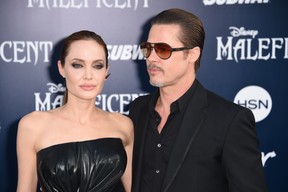 Angelina Jolie e Brad Pitt na premiere de 'Malévola' em maio de 2014 (Foto: AFP)