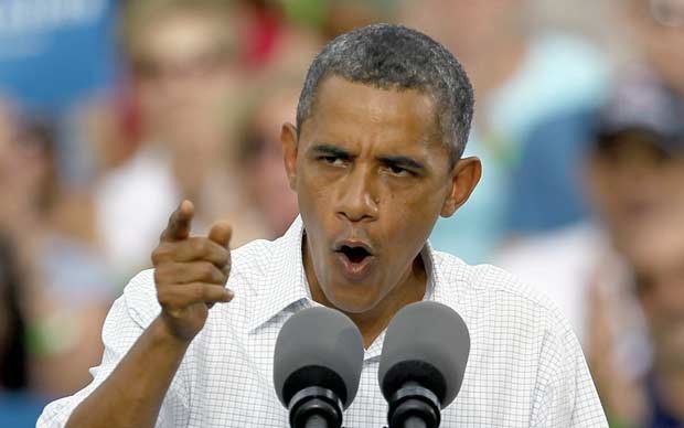 O presidente dos EUA, Barack Obama, durante evento de campanha em Davenport, Iowa, nesta quinta-feira (16) (Foto: AP)