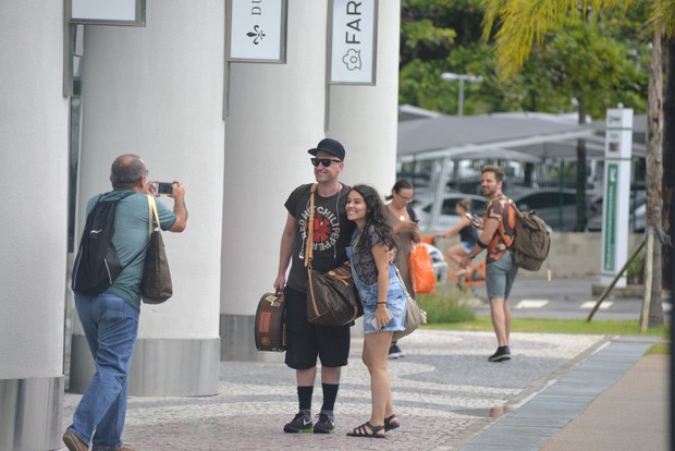 Paulo Gustavo Volta de Ferias com seu marido no Aeroporto Santos Dumont (Foto: AgNews / AgNews)