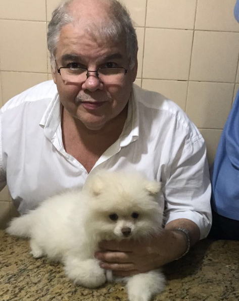 O deputado federal Lúcio Vieira Lima e seu cachorro Carreirinha (Foto: Reprodução)