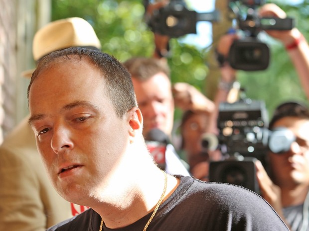 Matthew Apperson, que teria trocado tiros com George Zimmerman, chega ao Departamento de Polícia de Lake Mary, na segunda-feira (11) (Foto: Red Huber/Orlando Sentinel via AP)