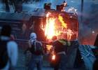 Manifestantes e polícia entram em confronto 
na Venezuela (Federico Parra/AFP)