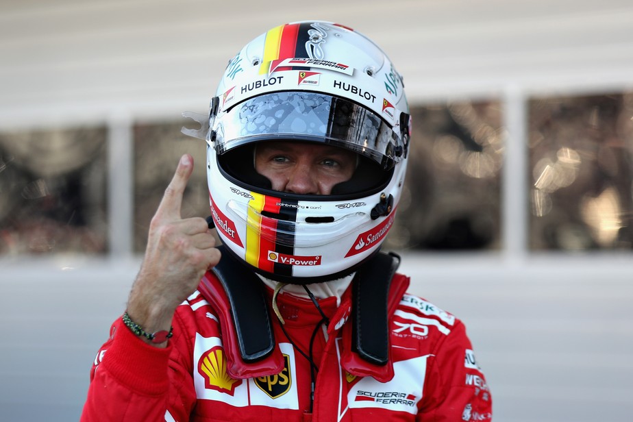 Com Vettel na pole e Kimi Raikkonen em 2º, Ferrari quebra jejum de nove anos