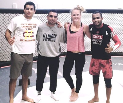 Holly Holm e Rafael Barata (Foto: Reprodução) Holly Holm e Rafael Barata (Foto: Reprodução)