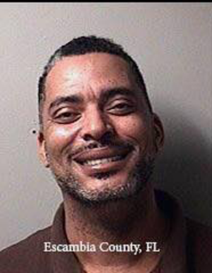 Chip sorri ao ser fichado pela polícia da Flórida (Foto: Reprodução)