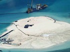 China coloniza mar disputado 'plantando' ilhas em corais