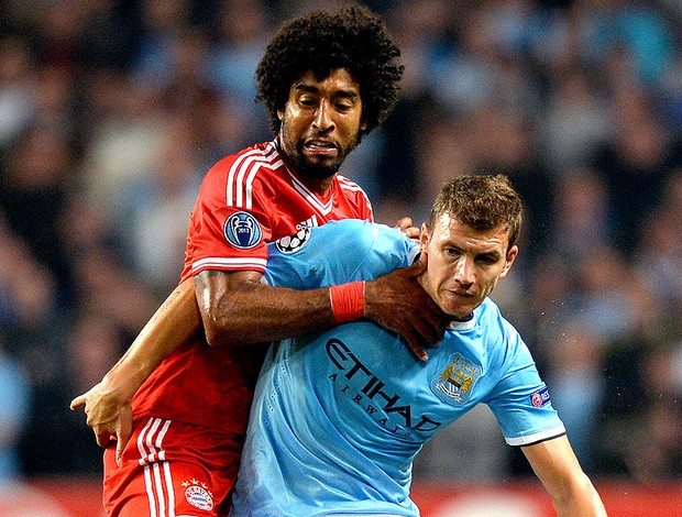 Dante jogo Bayern de Munique e Manchester City (Foto: AFO)