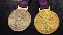 Medalhas de ouro e prata do casal (Foto: Filipe Rodrigues/ Globoesporte.com)