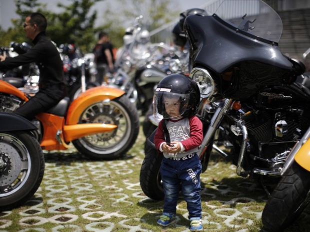 Criança também participa da celebração de 110 da Harley-Davidson (Foto: Carlos Barria/Reuters)