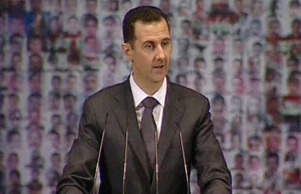 Bashar al-Assad, em discurso em Damasco neste domingo (6) (Foto: Reuters)