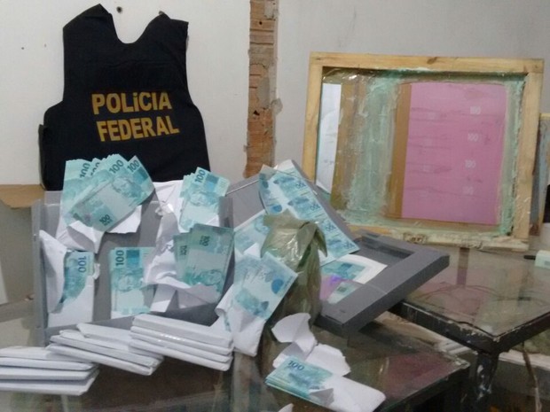 Resultado de imagem para PF investiga falsificação de notas de reais em São Paulo