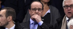 Presidente da França é retirado de estádio após explosões (AFP)