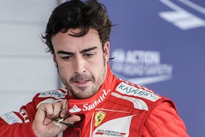 Para Alonso, RBR tem carro mais veloz, mas Ferrari tem melhor time' (AFP)