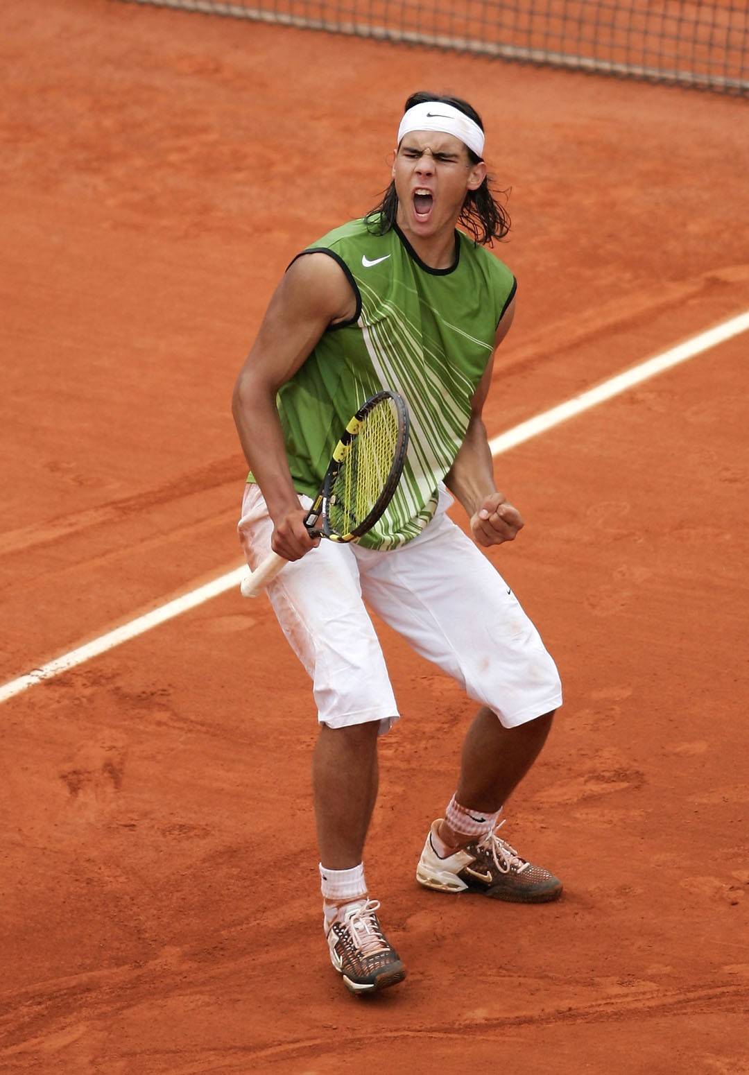 PARIS - JUNE 05:  Rafael Nadal of Spain celebrates a point during his 3-1 set victory over Mariano Puerta of Argentina during the Mens Final match during the fourteenth day of the French Open at Roland Garros on June 5, 2005 in Paris, France.  (Photo by M (Foto: Getty Images)