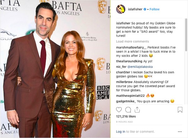 A atriz Isla Fisher e o ator Sacha Baron Cohen, na foto compartilhada pela artista na qual ela diz que os seios dela merecem ser premiados (Foto: Instagram)
