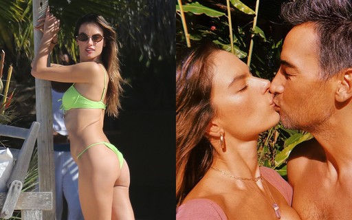 Alessandra Ambrosio troca beijos e posa para as lentes do namorado em praia