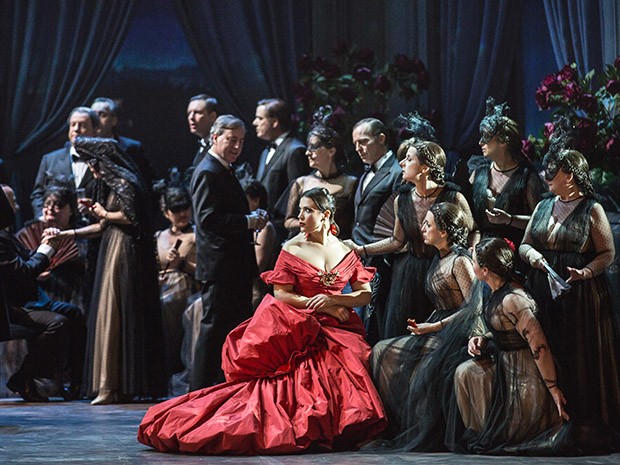 Violetta radiates stage presence in a gown designed by Valentino himself. Her high-society 