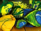 Empresa investe em tatuagens e bolsas verde e amarelo para a Copa