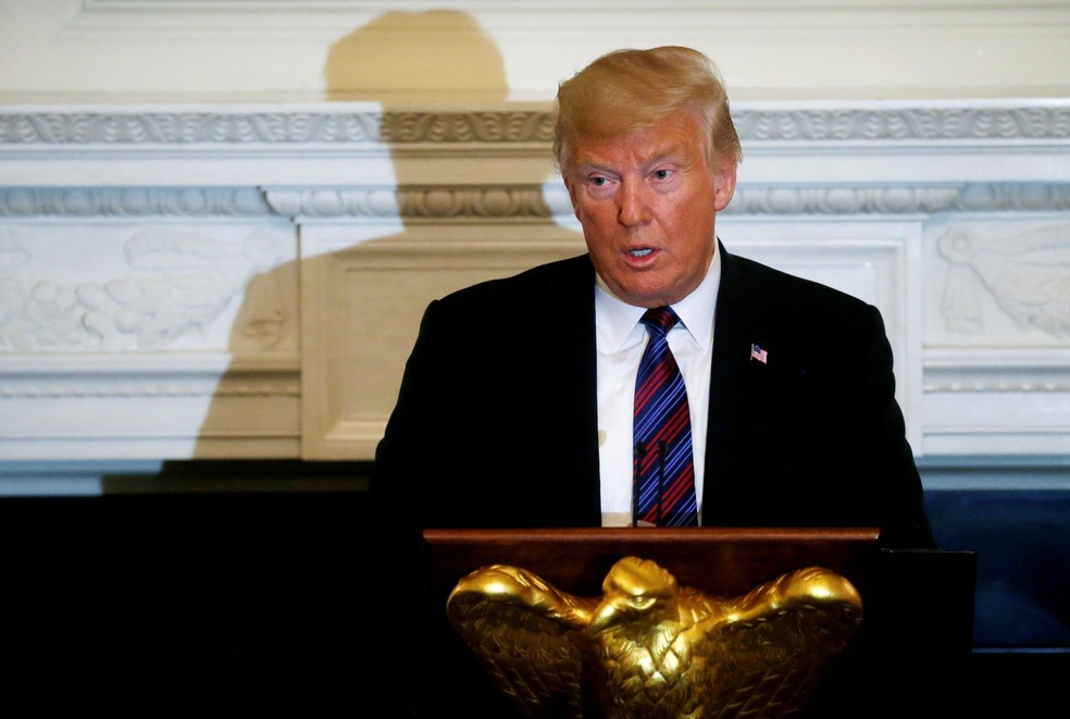 Presidente dos Estados Unidos, Donald Trump, fala durante jantar para homenagear a lideranÃ§a evangÃ©lica na Casa Branca, em Washington, na segunda-feira (27)  (Foto: Leah Millis/Reuters )