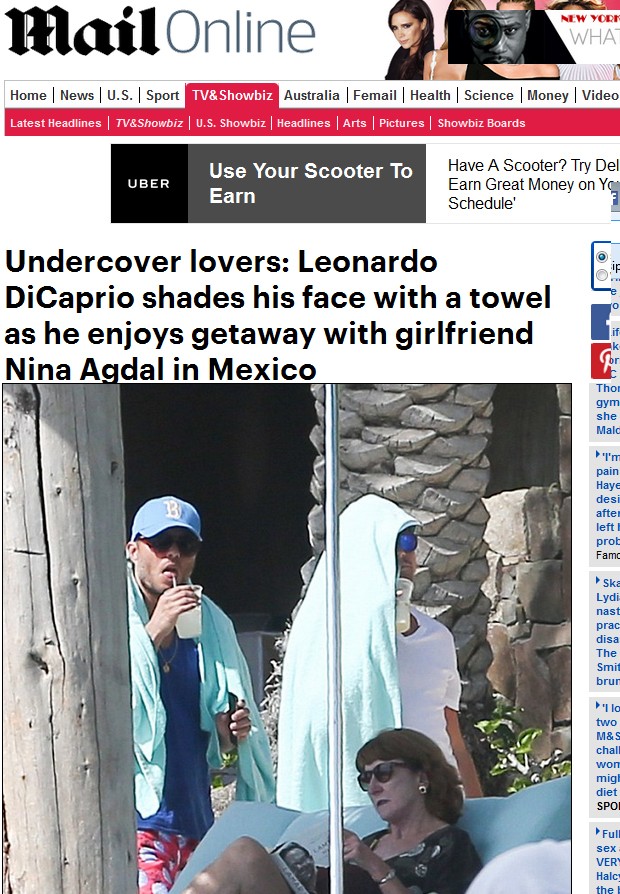 Leonardo DiCaprio cobre o rosto com toalha branca (Foto: Reprodução/Daily Mail)