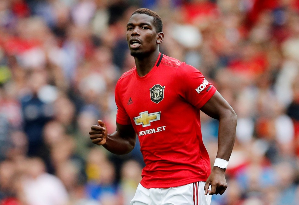 Pogba com a camisa do Manchester United — Foto: Phil Noble/Reuters