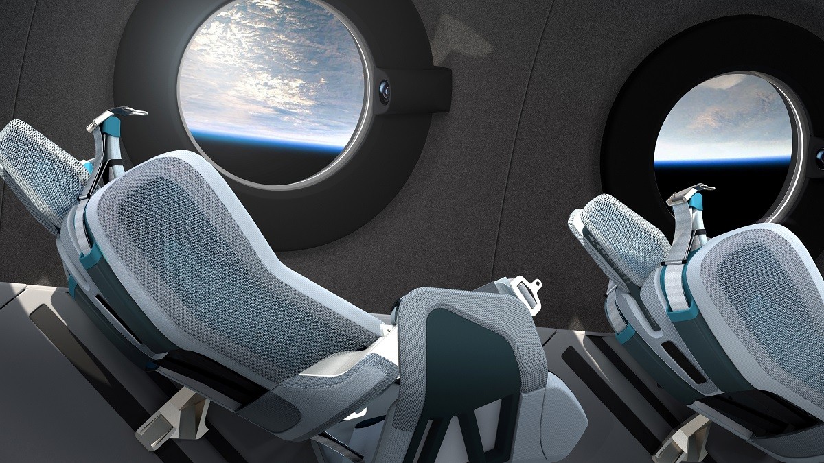 A nave da Virgin Galatic tem câmeras instaladas junto à janela para que o passageiro possa fazer selfies com a Terra ao fundoDivulgação / Via Reuters