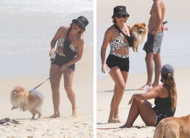 Flávia Alessandra e Giulia Costa na praia com seus pets (Foto: AgNews)