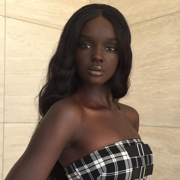 Modelo barbie negra best sale