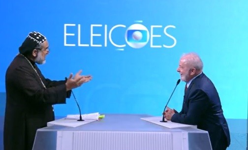 Os candidatos do PTB, Padre Kelmon, e do PT, Lula protagonizaram uma das discussões mais acaloradas do debate da TV Globo — Foto: Reprodução