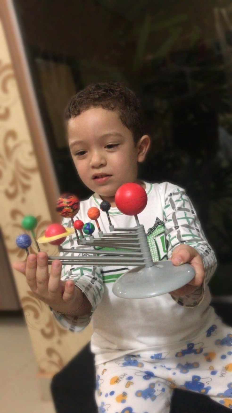 Desde muito novo, Guilherme demonstrou paixão pelo sistema solar  — Foto: Arquivo pessoal 