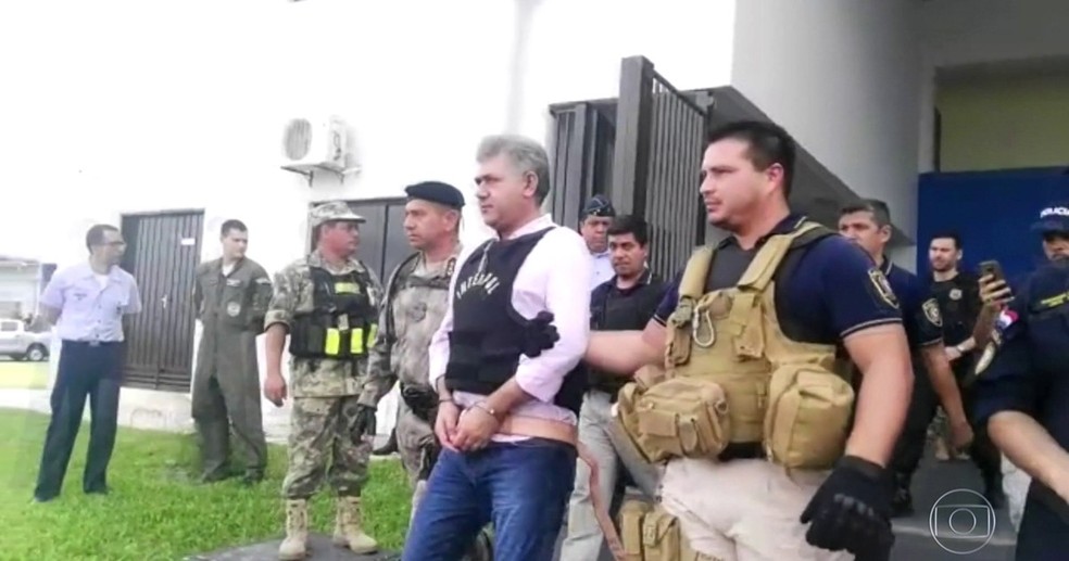 Jarvis PavÃ£o sendo extraditado para o Brasil â?? Foto: Rede Globo/ReproduÃ§Ã£o