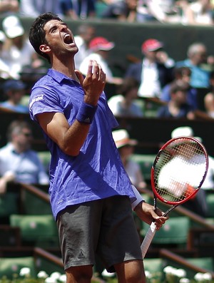 Thomaz Bellucci perdeu Nikishori na segunda rodada em Roland Garros (Foto: Reuters)