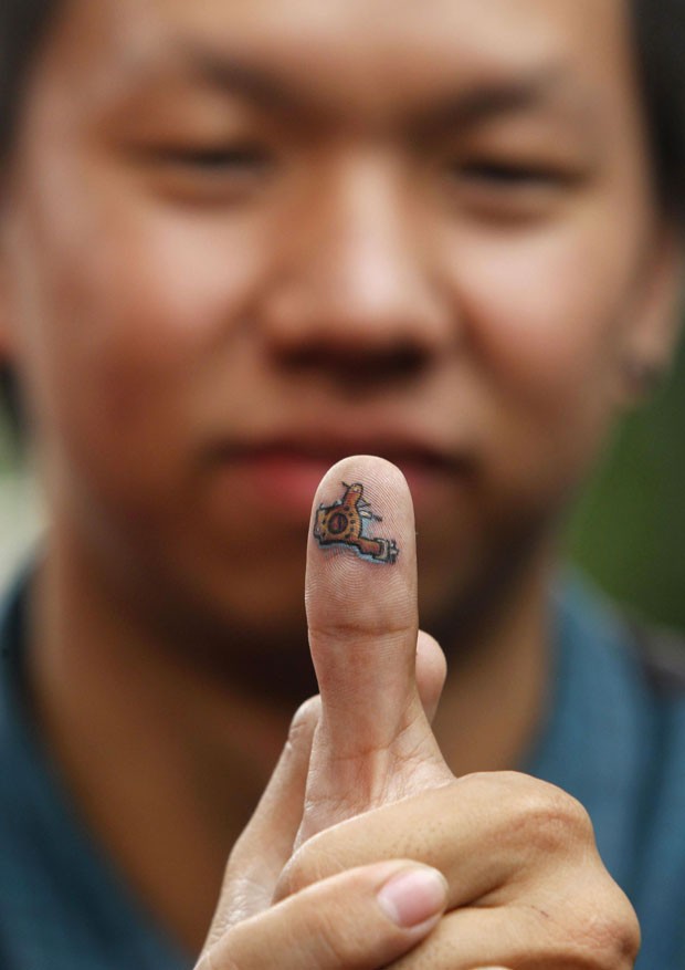 Tatuagem nos dedos - Portal Tailândia