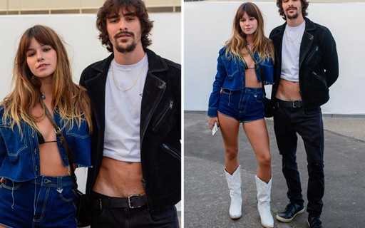 De cropped e calça de cintura baixa, Bruno Montaleone curte Rock in Rio com a namorada
